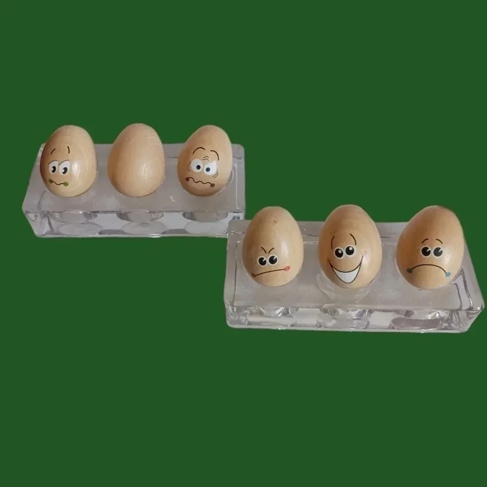 Chicken eggspression faces on wooden background set of 6